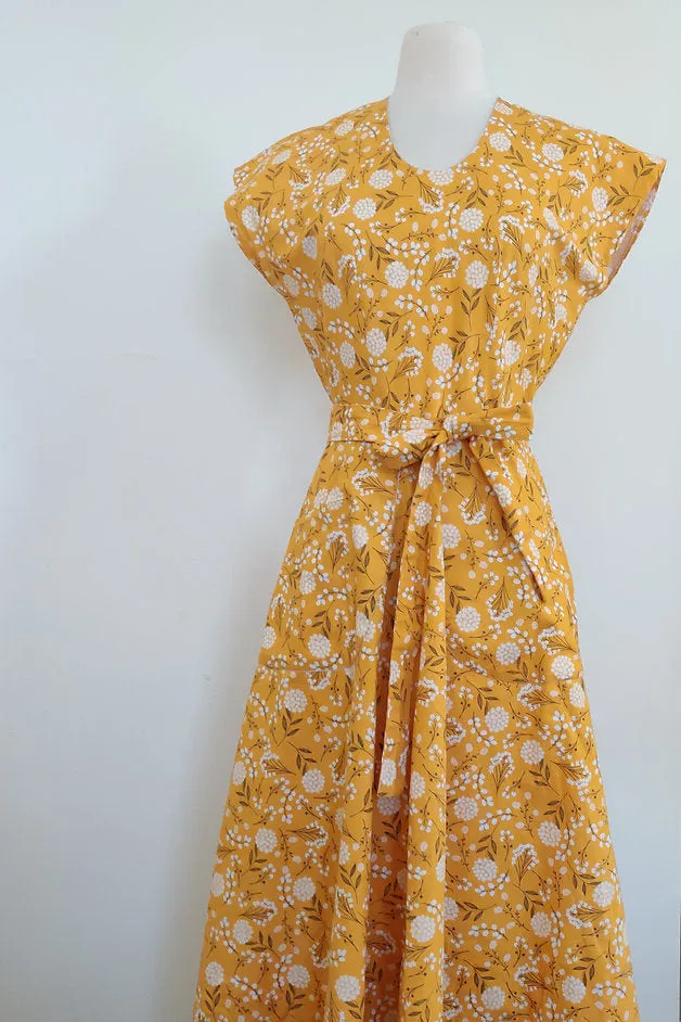 Marigold floral Swirl style wrap dress 1950s cotton day dress
