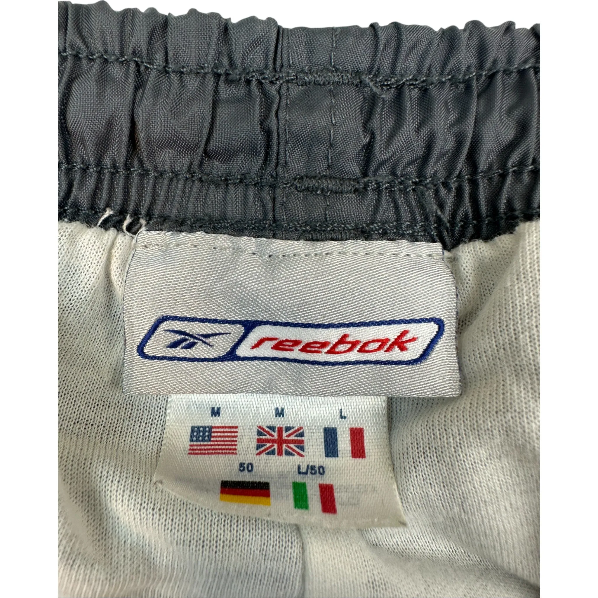 REEBOK “BLANK” TRACKPANTS - (M)