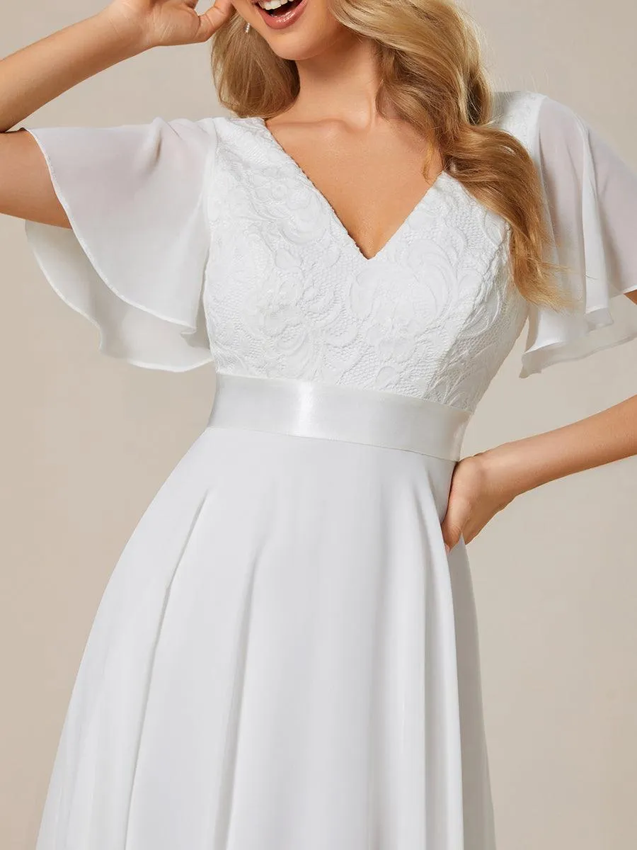 Robe de demoiselle d'honneur à ourlet asymétrique taille empire manches courtes longueur genou
