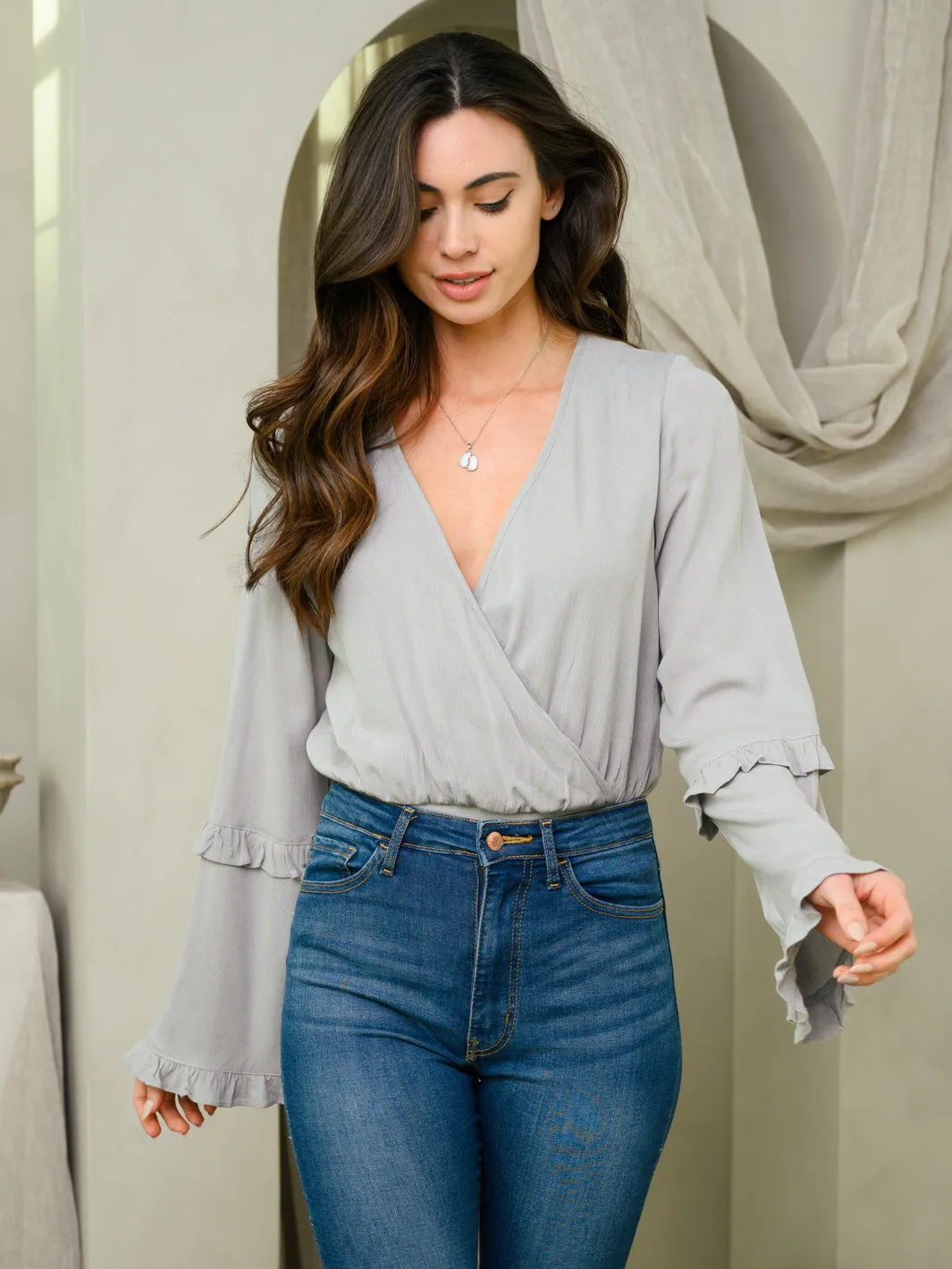 WOMEN'S LONG BELL SLEEVE SURPLICE BODYSUIT
